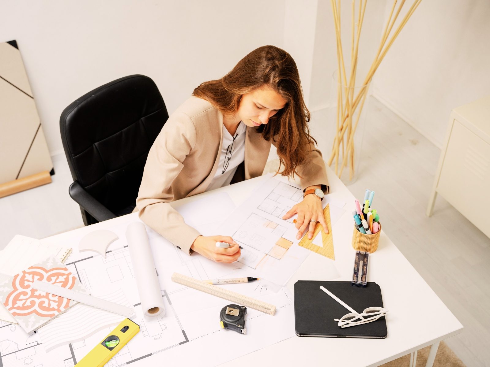 Person reviewing documents at a desk